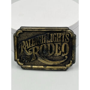 VINTAGE 1981 RALEIGH LIGHTS RODEO WESTERN MENS BRASS BELT BUCKLE SEE ALL